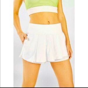 Fabletics tennis white skort. Never been worn before